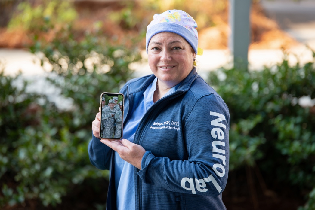 A picture containing person, outdoor, tree  Description automatically generated