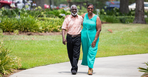 Andrew Reed and wife walking
