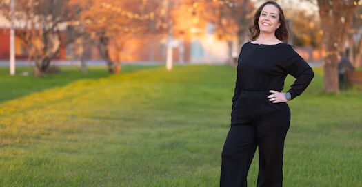 Kelly Graham smiling outside