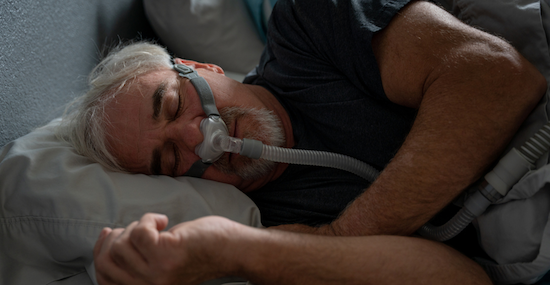 Man suffering from sleep apnea